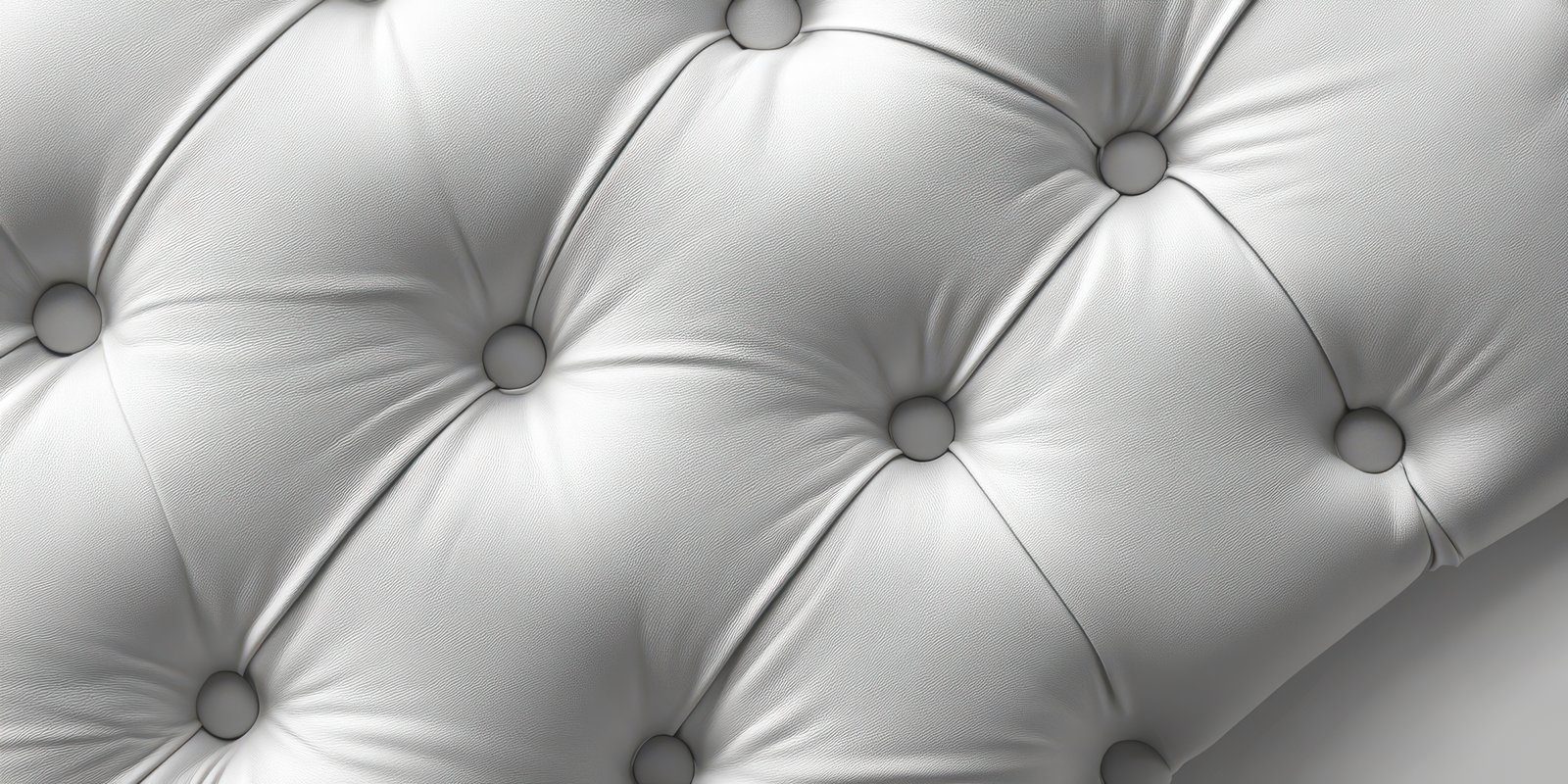 Soft white tufted leather upholstery with buttons providing elegant texture and comfort